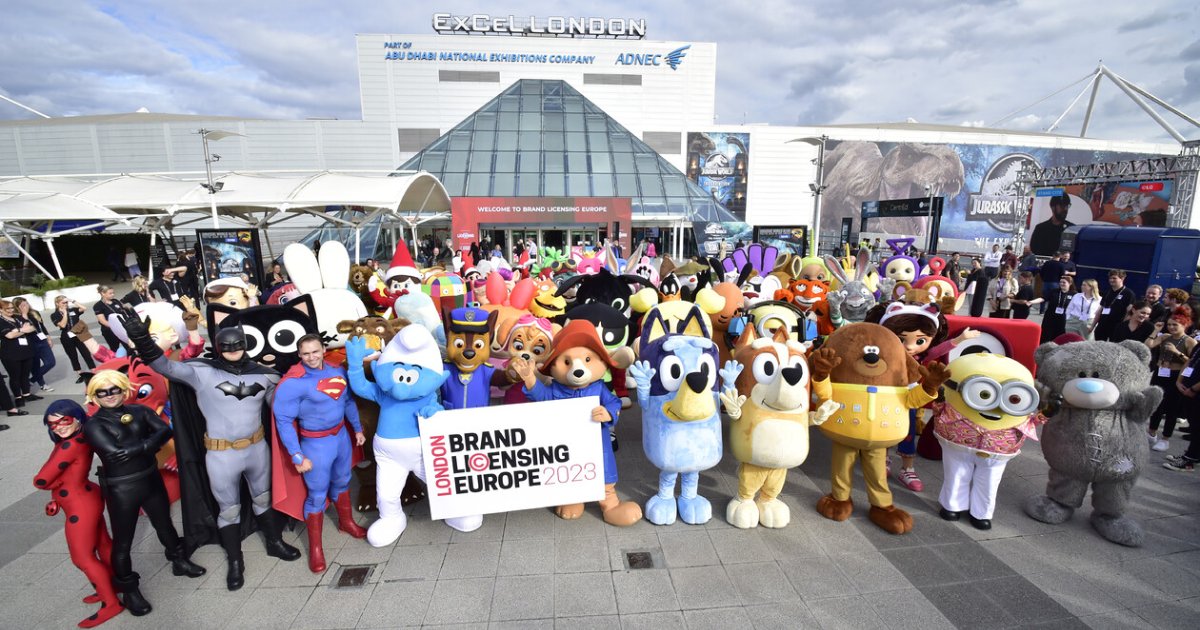 Character and mascots participating in a parade at the Brand